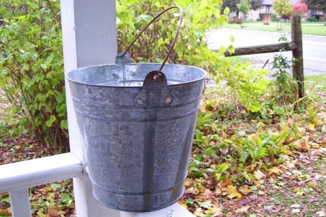 Hanging Metal Buckets Weathered Wood