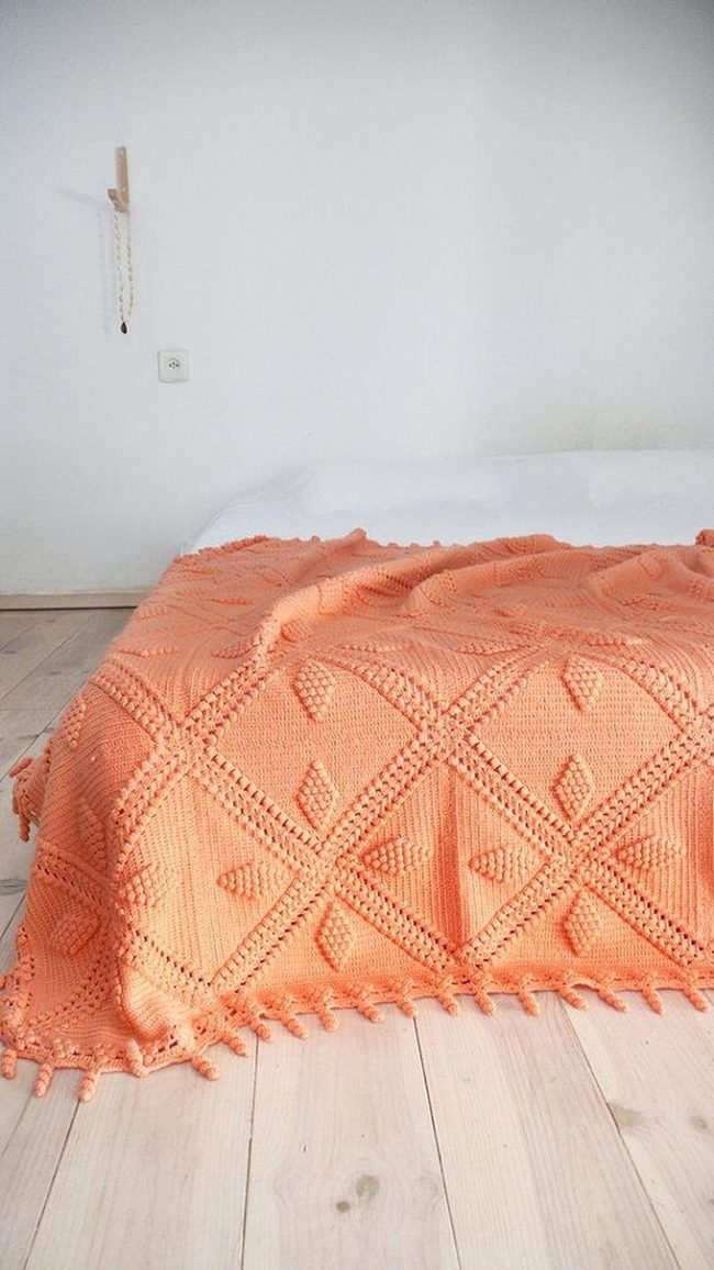 Orange Blanket Transforms Minimal Bedroom