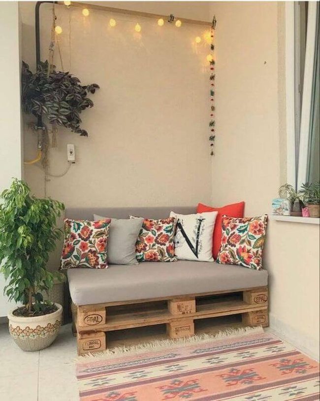 Colorful Cushions On Wooden Pallets