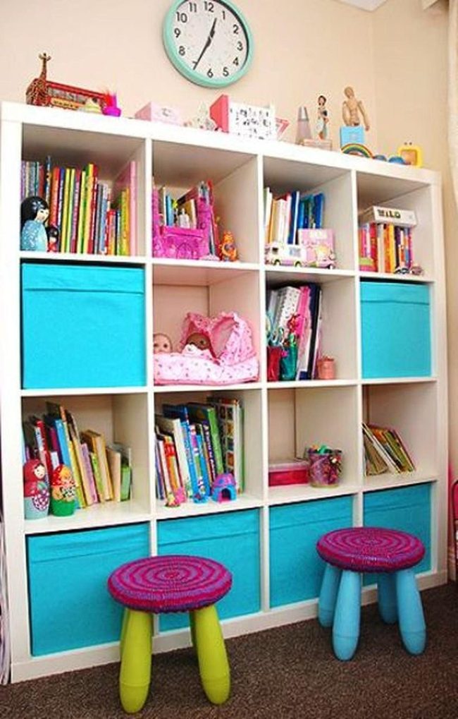 Colorful Books White Shelves Blue Bins