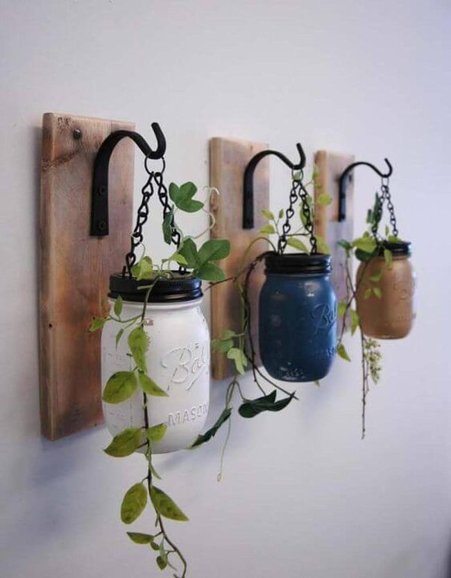 Cascading Green From Earth-Toned Jars