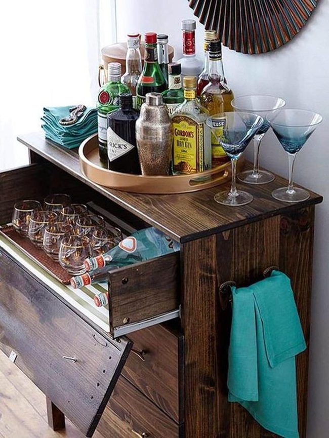 Dark Wood Bar Cabinet With Blue Martini Glasses