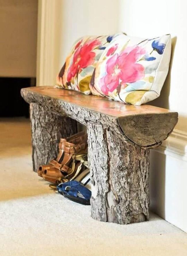 Weathered Wood Bench With Floral Cushions
