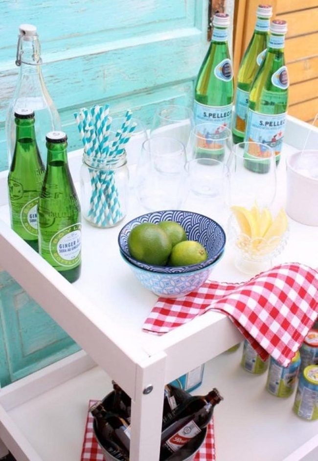 White Cart With Green Bottles And Lime