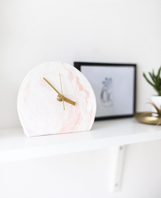 Gold Clocks White Shelves Green