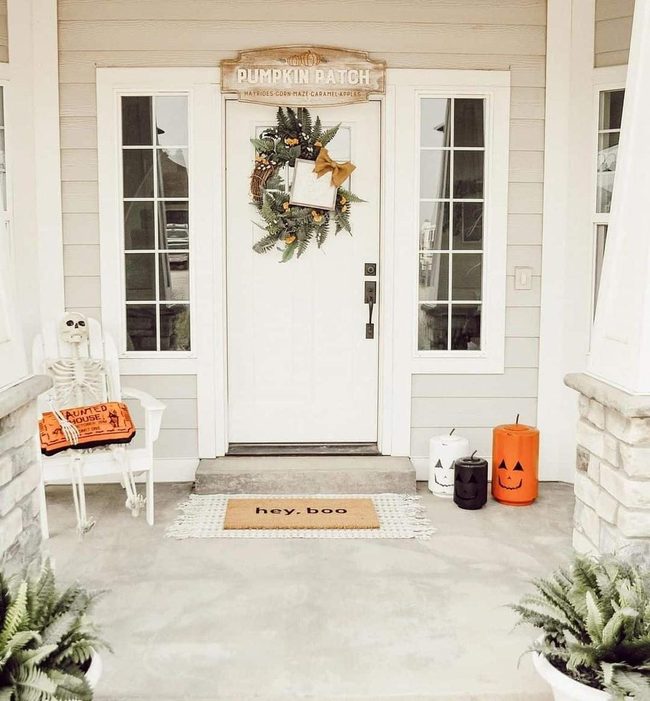 Skeleton Porch With Fern Marigold Wreath