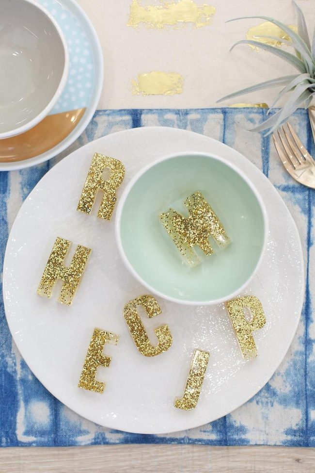 Golden Letters On White Plates