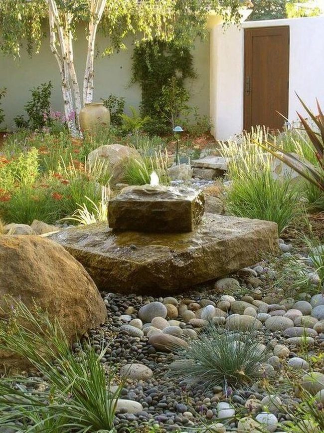 Stone Water Feature With Living Plants