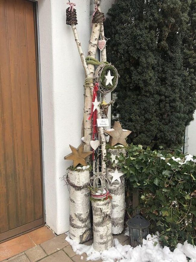 Stacked Birch Logs Winter Display
