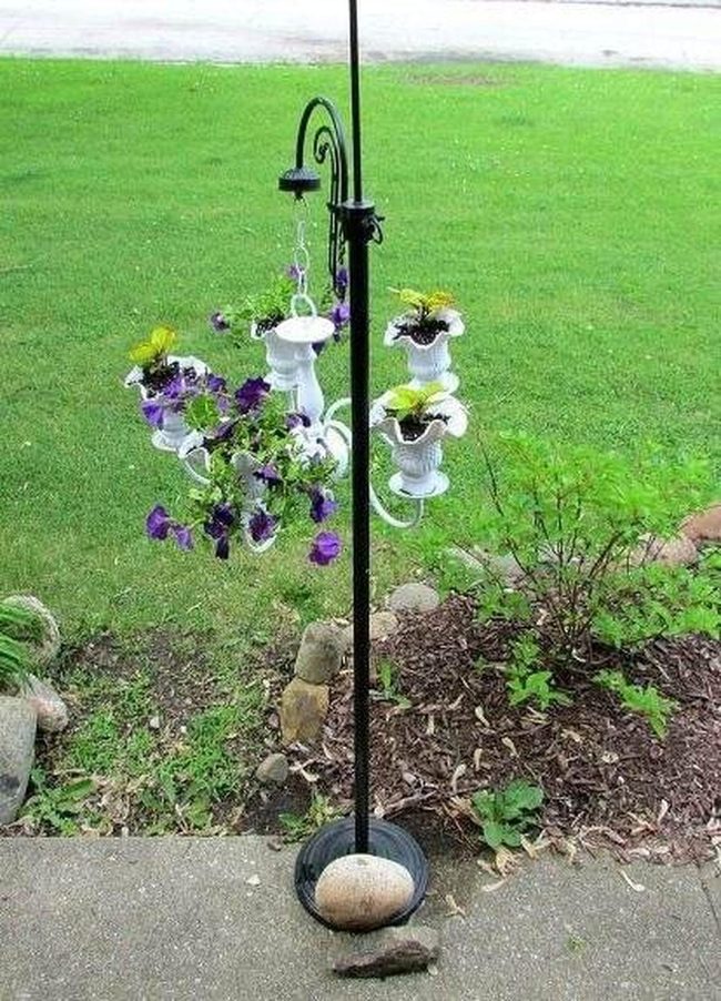 White Ceramic Flowers On Metal Stand