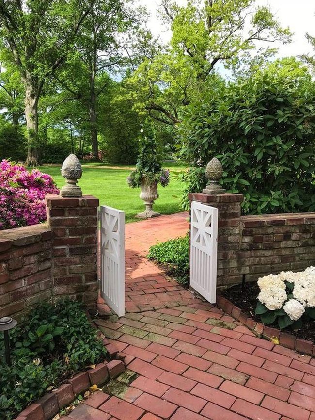 Brick Paths Through Blooming Gardens