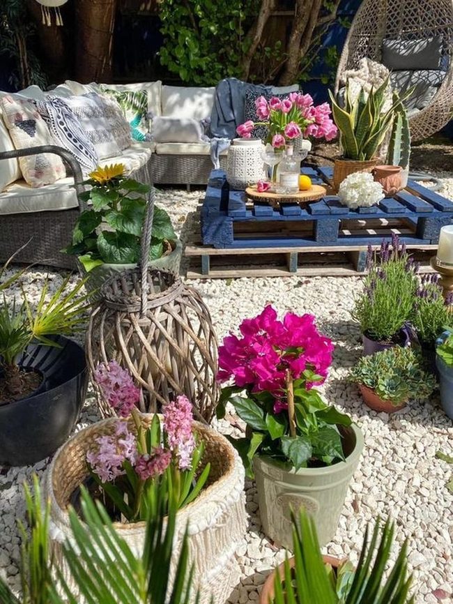 Potted Flowers And Pallet Tables