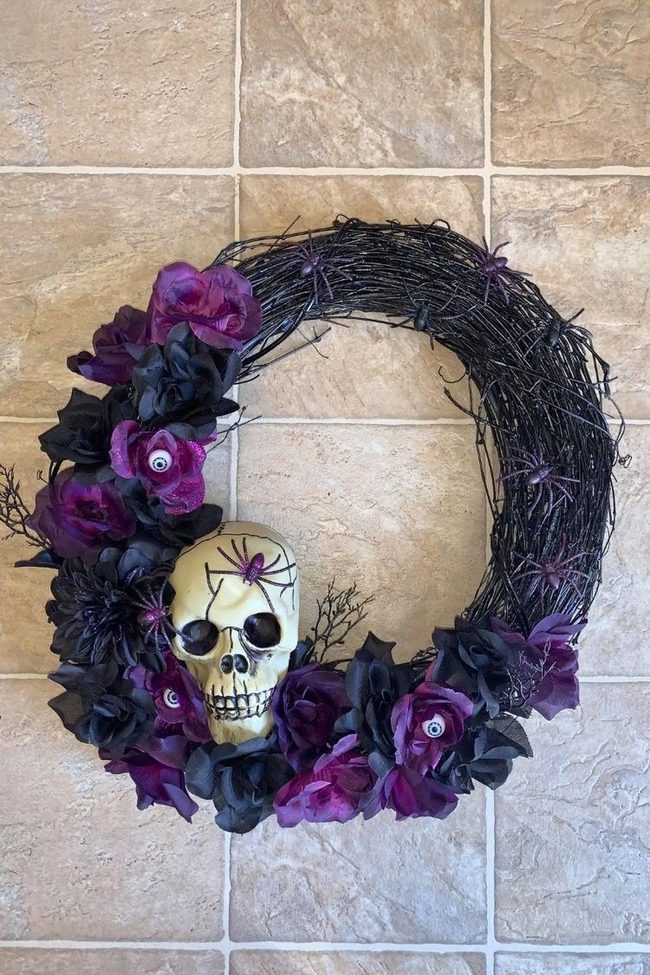 Black Grapevine Wreath With Purple Blooms