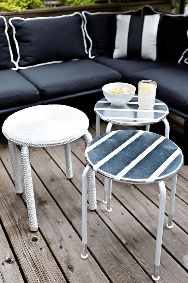 Navy Couches, Striped Tables, Wooden Deck