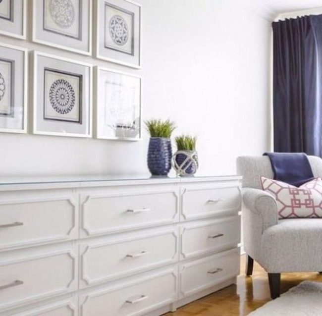 Circular Frames Above White Dresser