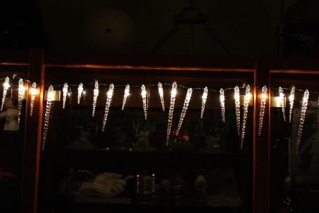Pale Icicle Lights On Wood