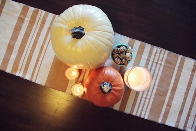 White And Orange Pumpkins On Striped Runner