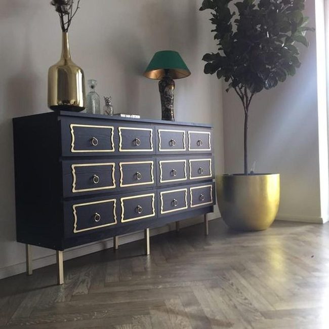 Golden Handles On Black Dresser