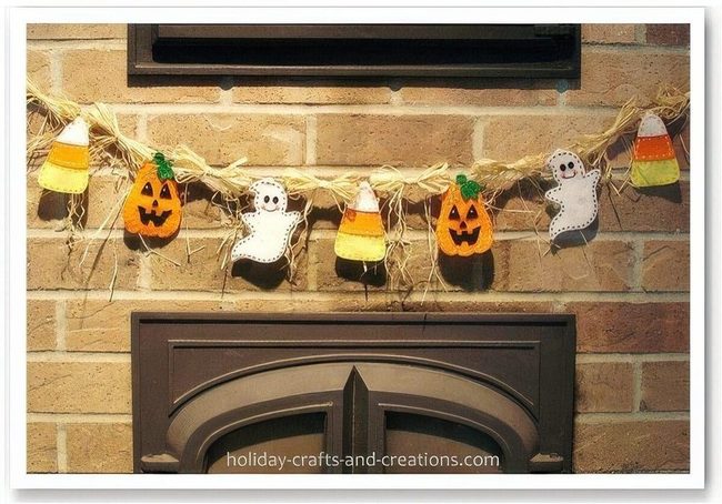 Pumpkin Faces With Candy Corn Raffia
