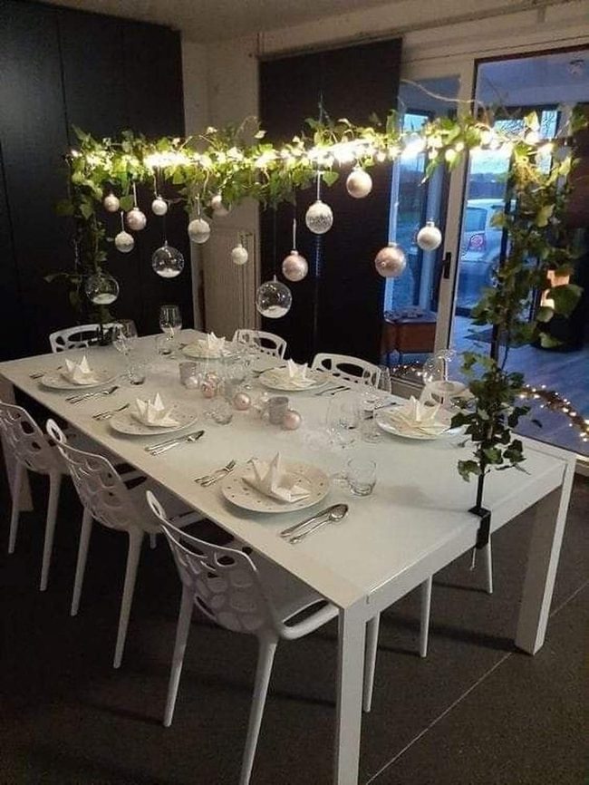 White Tables With Cut-Out Chair Details