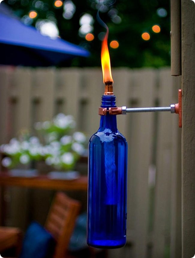 Blue Glass Bottles Illuminate Garden