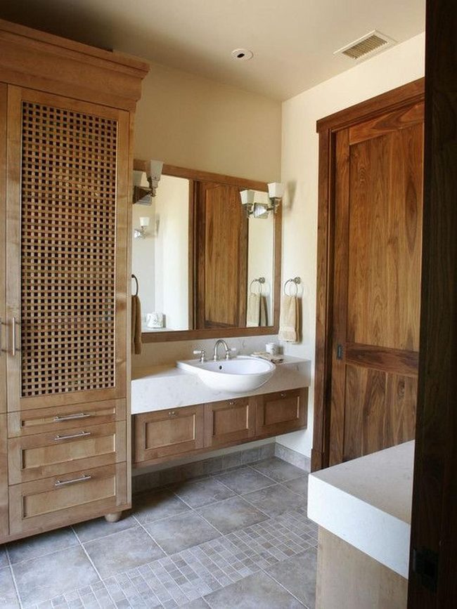 Natural Wood Bathroom With White Countertop