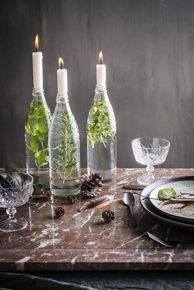 Fresh Herbs In Glass With Candlelight