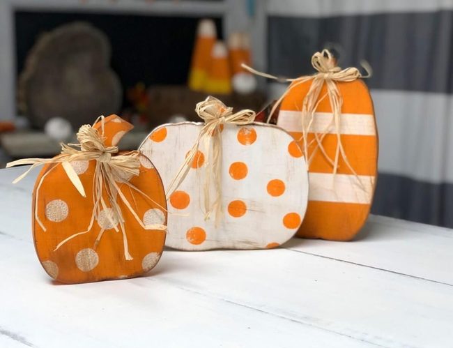 Wooden Pumpkins In Bright Paint