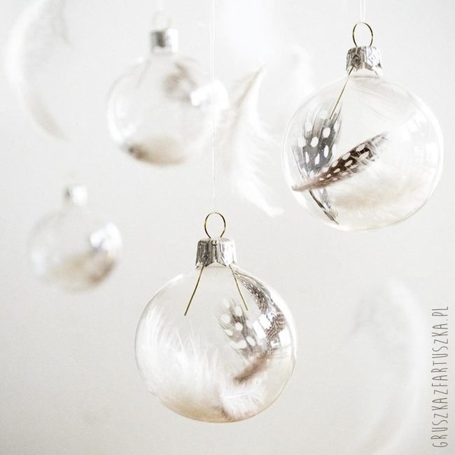 Suspended Feathers In Clear Glass