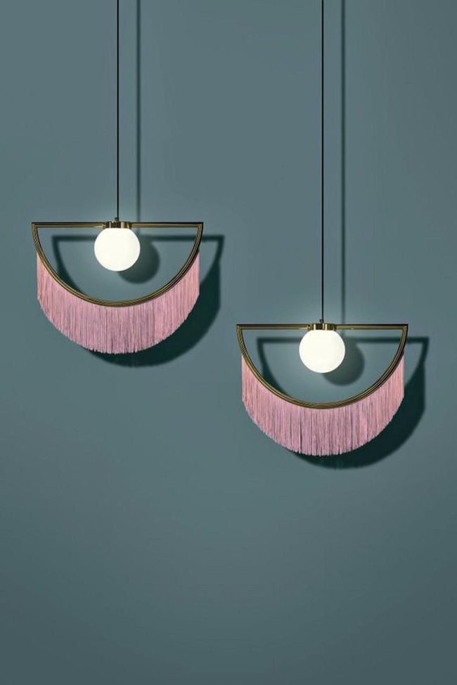 White Bulbs Under Gold Arches