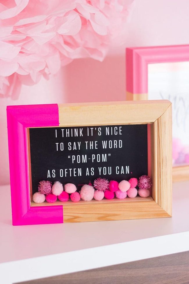 Pink Pom-Poms With Natural Wood
