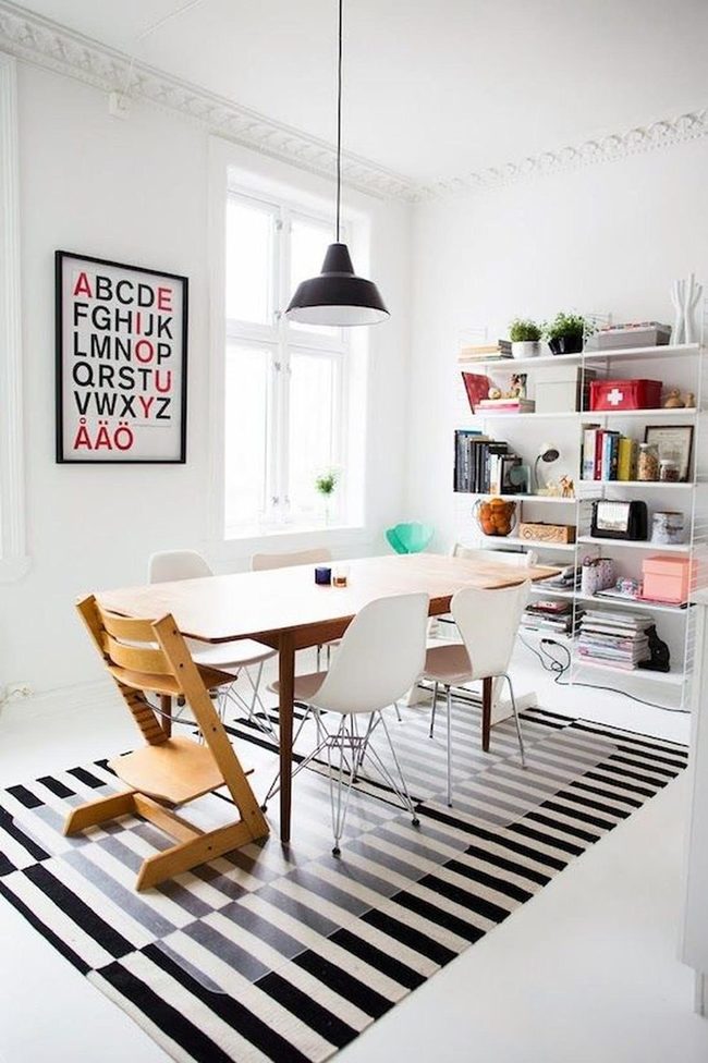 Natural Wood Table With Striped Floor Drama