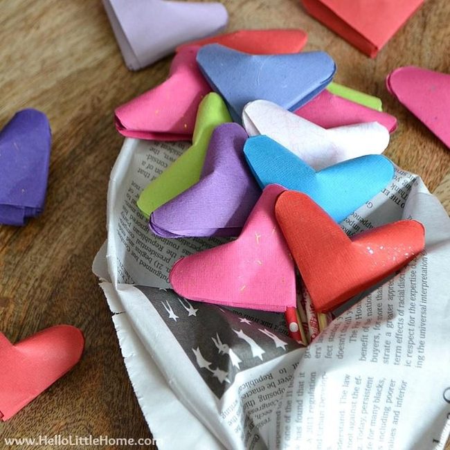 Handfolded Paper Hearts On Weathered Wood