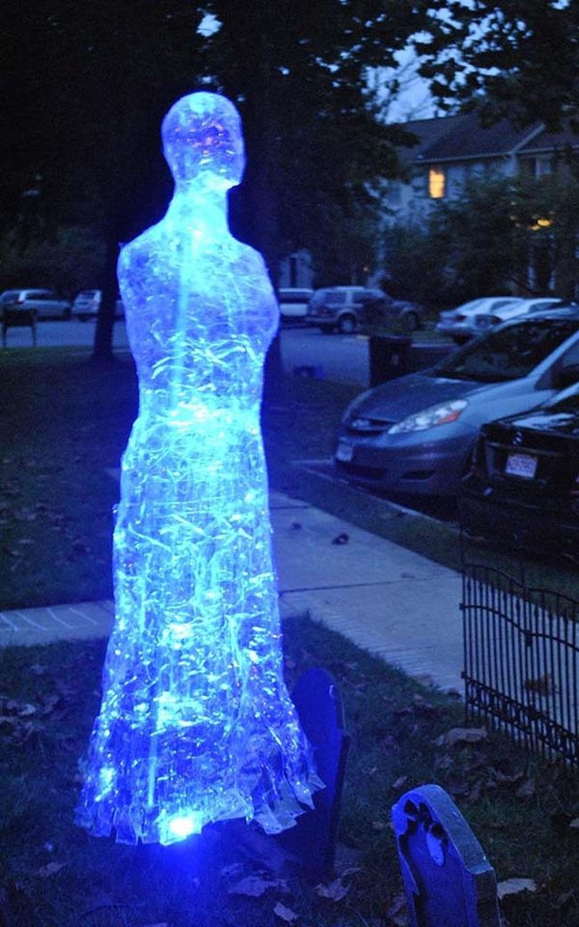 Glowing Ghost Figures Haunt Pathways