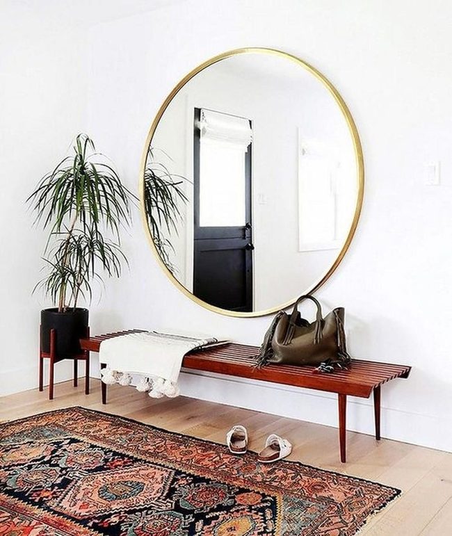 Gold Mirrors Meet Jewel-Toned Rugs