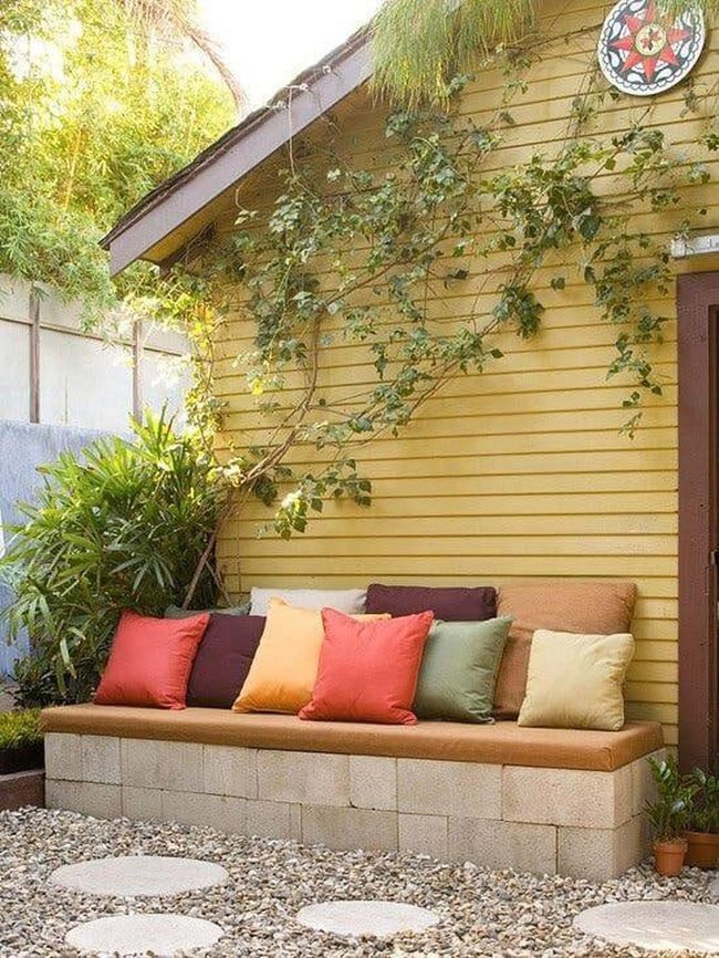 Orange Cushions On Stacked Cinder Blocks