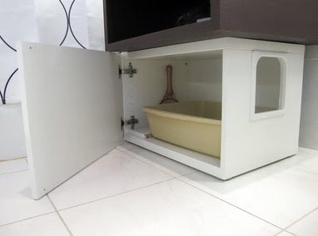 White Cabinet Hides Cat Litter