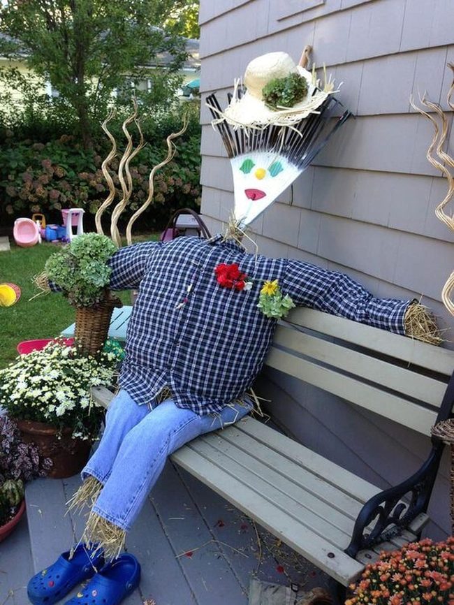 Straw Friend Among Blooms