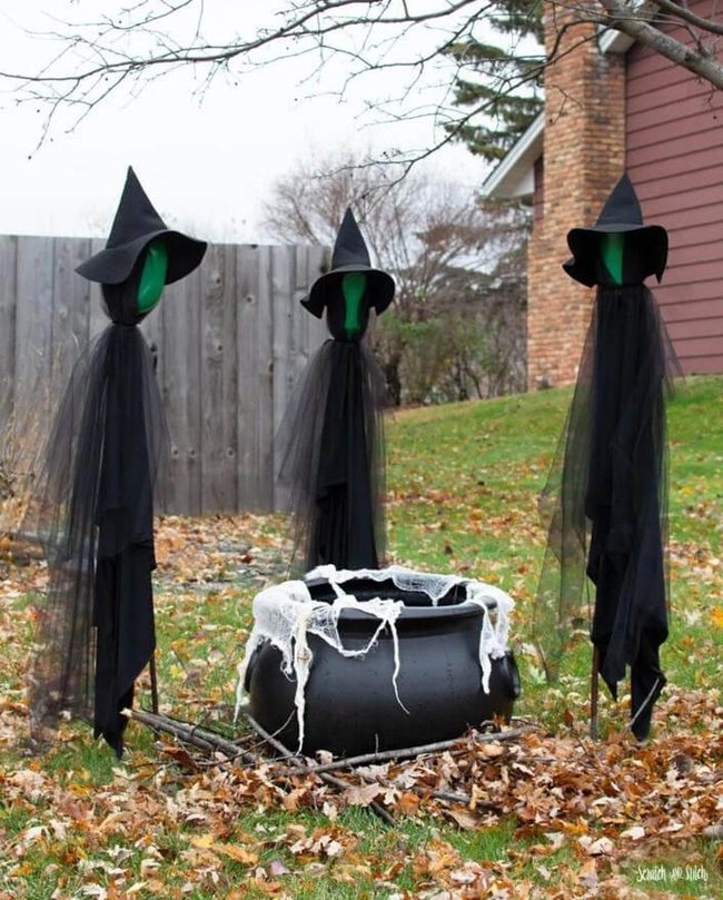 Witches Dancing Over Autumn Cauldron