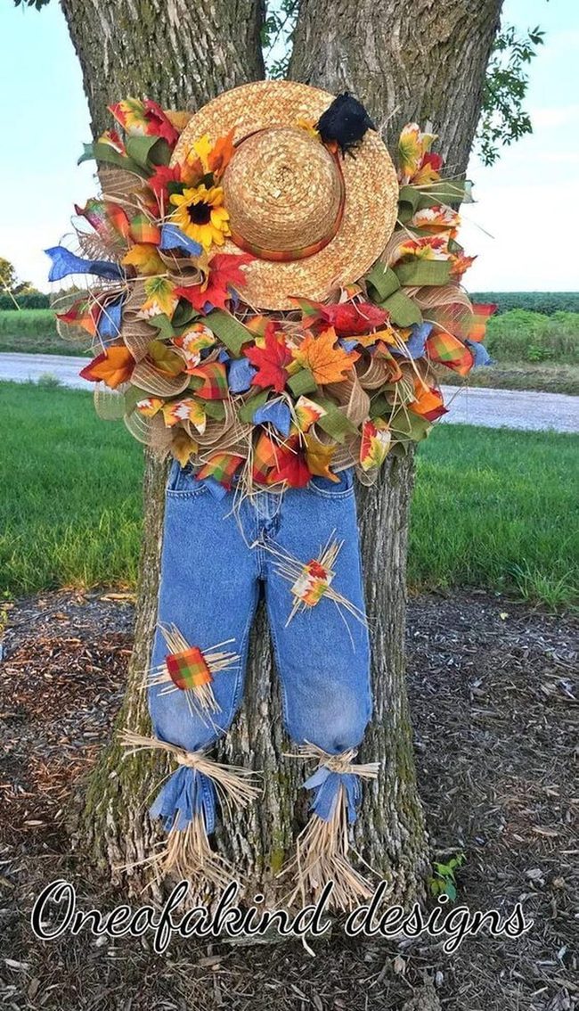 Denim Scarecrow Among Wildflowers