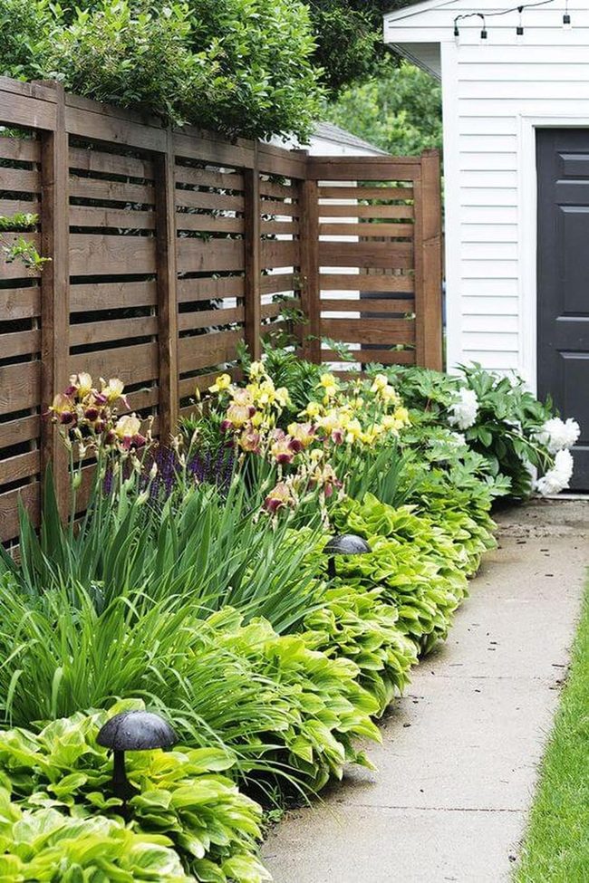Wooden Slats With Blooming Garden