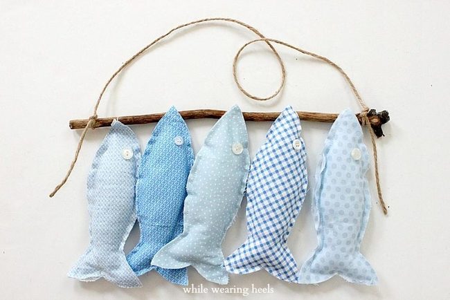 Five Blue Fabric Fish On Driftwood
