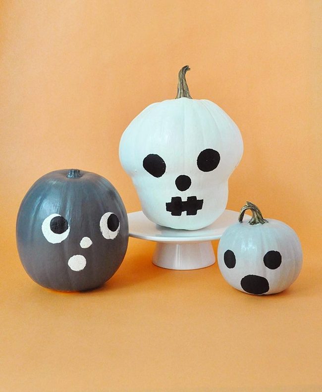 Painted White Pumpkins Haunting Orange Backdrop