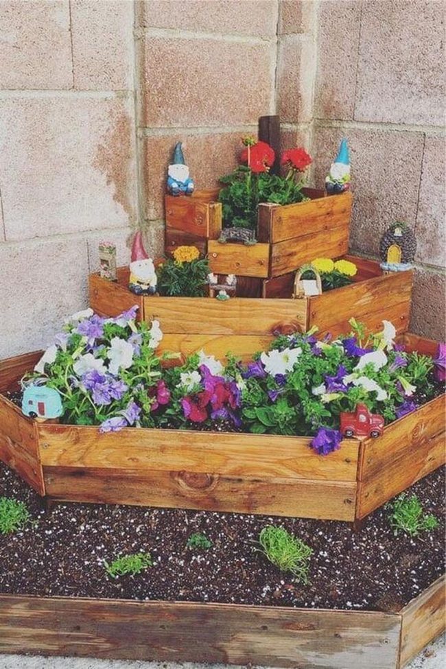 Stacked Wood Pallets Bursting With Blooms