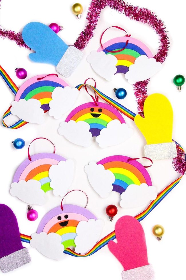 Smiling Rainbows With Fluffy Clouds