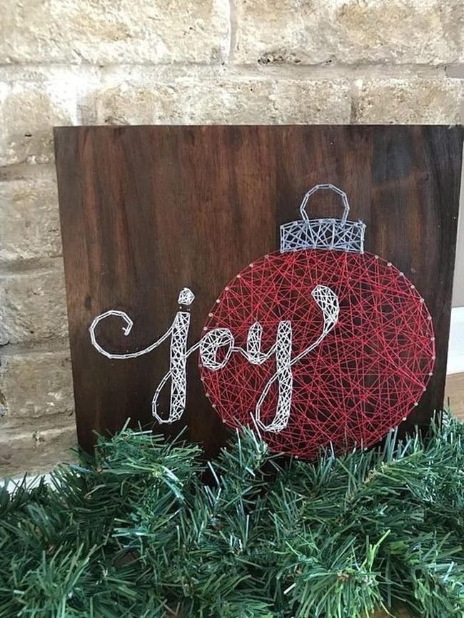Red Thread Joy Against Wood