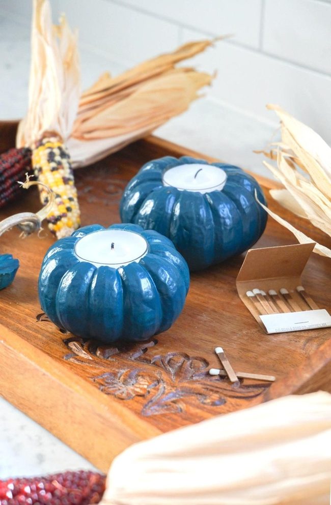 Blue Pumpkin Candle Holders On Wood