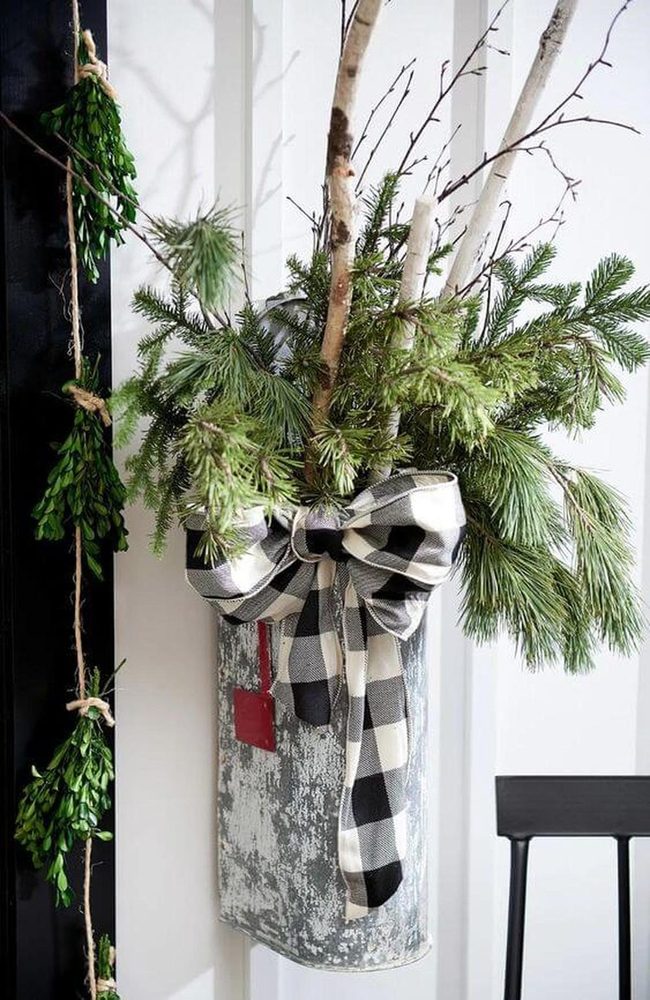 Black Checkered Ribbon Through Fresh Branches