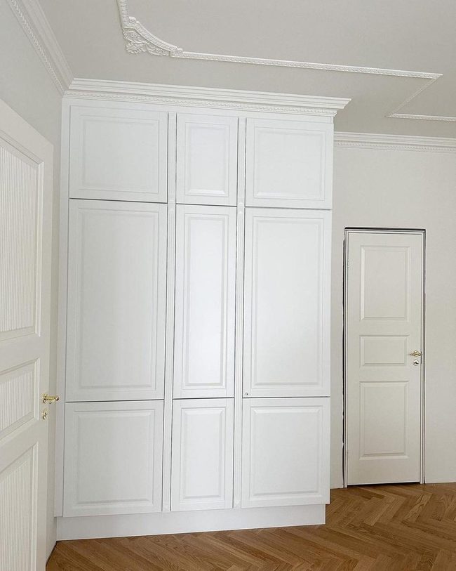 White Walls With Warm Wood Floors