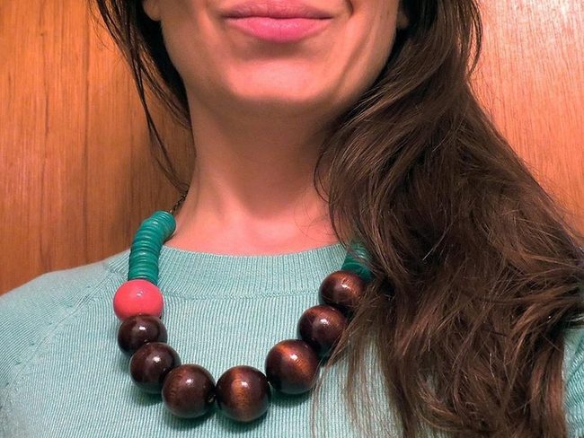Coral Pop Against Brown Beads